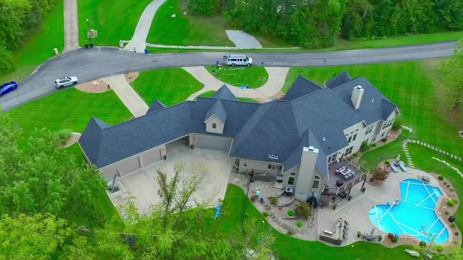 Completed charcoal shingle roof, drone view