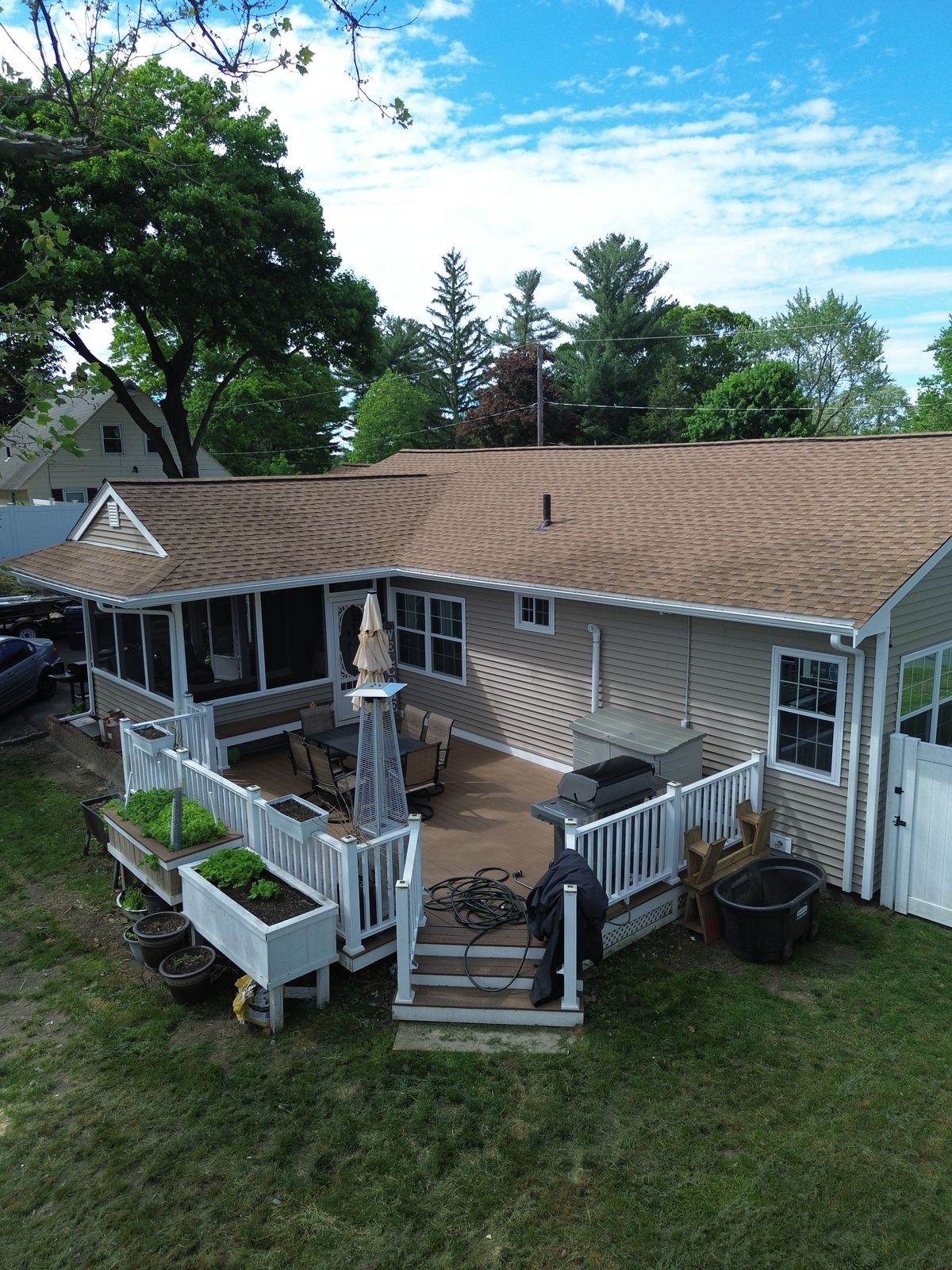 Completed Imperial Construction exterior project with new roof and deck